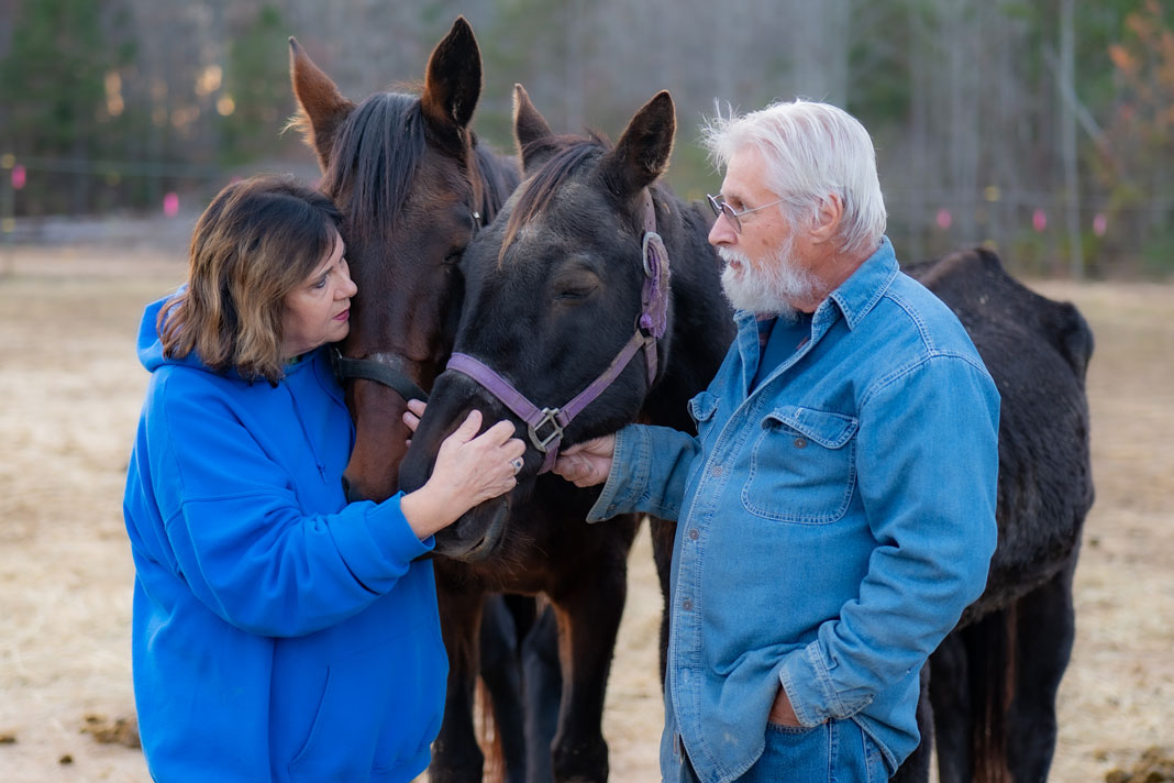 Susan and Paul with rescued horses